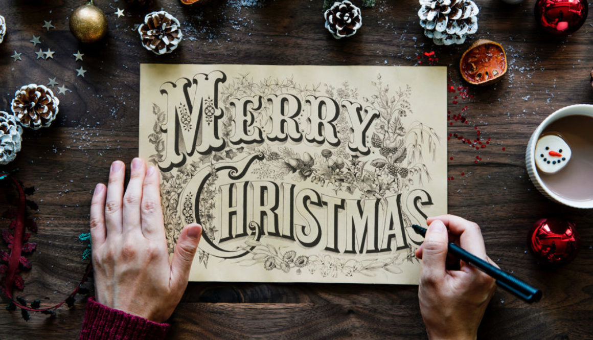 Merry Christmas Handwritten Design on Paper